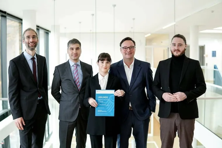 A photo of Timelords founders and German state official  Oliver Luksic